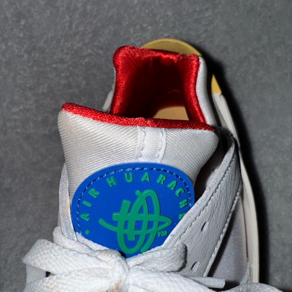 White Nike Huaraches shoes with Blue Logo.
Women’s size 10 - Picture 4 of 7